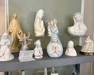 Collection of religious porcelain figures and busts