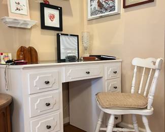 Mirror top white 7-drawer desk, a matching spindle-back chair and decorative wall art