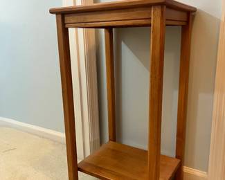 Wood pedestal plant stand or side table with lower storage shelf