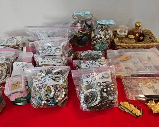 Bags of usable Jewelry, Perfume....possibly even more to be added