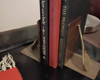 Metal figural bookends with hardcover books