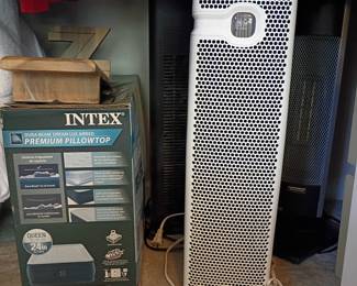 Tower air purifier and INTEX air mattress in box