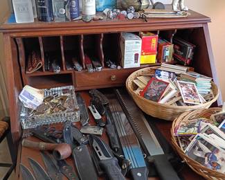 Pocket knife collection and roll-top desk