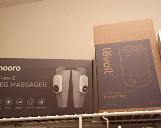 Nooro leg massager and Levoit humidifier in boxes