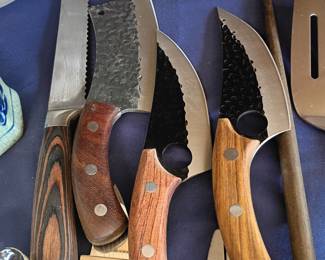 Hand-forged hunting and skinning knives with wood handles