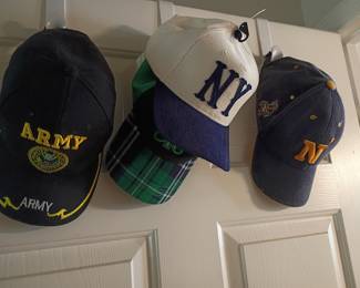 Army, NY Yankees, and Navy baseball caps