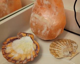 Himalayan pink salt lamp with seashells