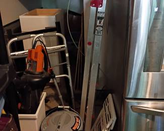 Mobility walker, 5-gallon buckets, assorted garage items