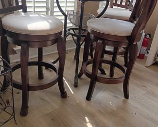 Pub height bistro table with leather bar stools