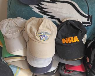 Baseball cap collection including NRA and Predators