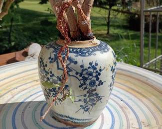 Blue and white porcelain planter on ceramic plate