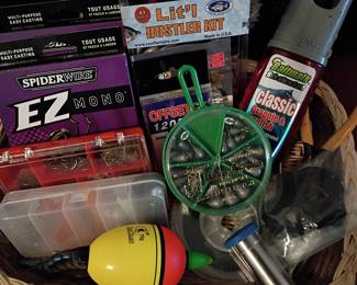 Fishing tackle lot: SpiderWire line, lures, bobbers, tackle box