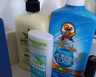 Toiletries lot: Australian Gold sunscreen, Jason Tea Tree, lotions