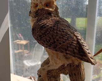 Detailed great horned owl figurine sculpture