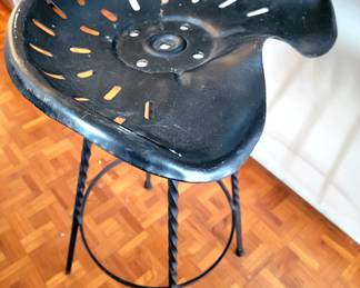 Handmade by a Blacksmith.  There are 3 of these counter stools