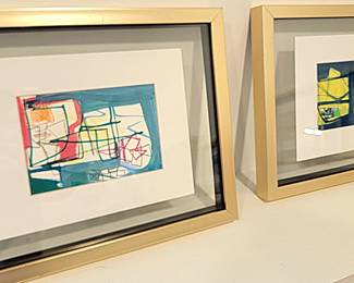 There are several of these framed floating art pieces