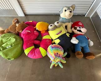 Lot #179 Assorted Collection of Large Plush Toys Including Mario, Minion, and Colorful Plush Snake