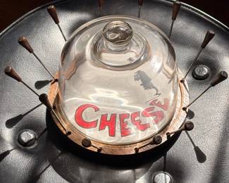 Cheese dish with skewers 