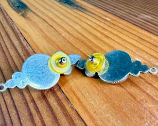 Silver earrings featuring circular design elements inlaid with turquoise and coral stones. The earrings have a post-back fastening with yellow rubber backs. Each features intricate detailing with multiple stone accents. Total approx. weight of 14.51 grams.