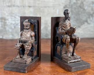 This lot features a vintage pair of wooden Don Quixote Spanish folk art bookends in good condition. “Made in Spain” tagged underneath.