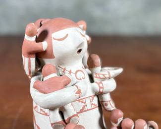 This lot features an original sculpture by listed Pueblo artist, Lupe Lucero Loretto. Signed underneath and measures, 5.25” H.