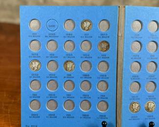 Mercury Head Dime collection spanning 1916 to 1945 housed in a blue Whitman Hobby album. Various coins from the series are included, with a total of thirty (30) in the album.