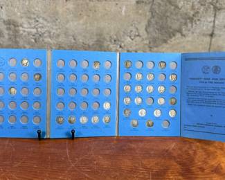 Mercury Head Dime collection spanning 1916 to 1945 housed in a blue Whitman Hobby album. Various coins from the series are included, with a total of thirty (30) in the album.