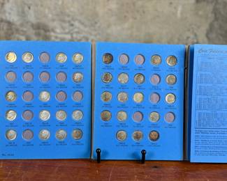 Roosevelt Dime collection starting in 1946, housed in a blue Whitman coin album. Includes multiple dimes, with several slots still unfilled. Total of thirty-two (32) 90% Roosevelt dimes included.