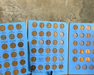 Three coin collection folders produced by Whitman Publishing Company, featuring Lincoln Cents (Collection 1909-1940, Number One; and Collection Starting 1941, Number Two) and Jefferson Nickels (Collection 1938 to 1961, Number One). The folders display various coins, including partially filled slots with different years. Condition shows general wear on the folders. Coin details and completeness vary.