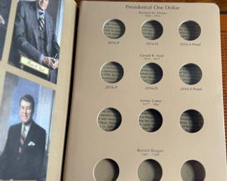 Complete 2007-2016 Presidential Dollar PDS 117-coin set featuring both brilliant uncirculated and proof coins. Coins are arranged in a dedicated album, with additional display cases for select presidential sets, including Richard Nixon, Gerald Ford, and Ronald Reagan. Includes original invoice indicating the purchase price of $339. Some missing as shown in photos.