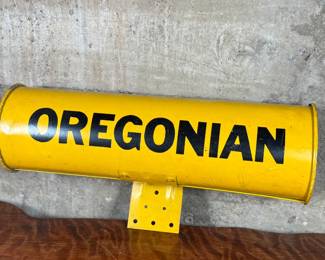 This lot features an original vintage newspaper holder with “OREGONIAN” written across.