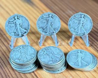 This lot features nineteen (19) 90% silver Walking Liberty half dollars.