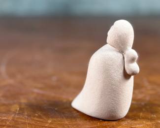 This lot features an original sculpture by listed artist, Maxine Toya and measures, 2.75” H.