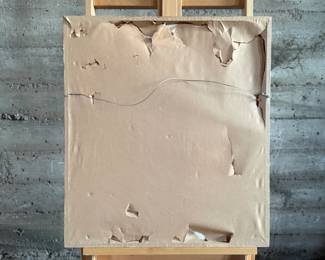 A framed painting depicting a portrait of a man wearing a purple headband. The artwork is signed ‘Rita’ in the lower right corner. The frame is wooden with a matte around the painting, and backed with paper that shows notable tearing. Frame is a bit loose. Measures in frame, 28” H x 23” W.