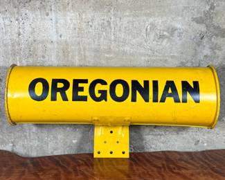 This lot features an original vintage newspaper holder with “OREGONIAN” written across.