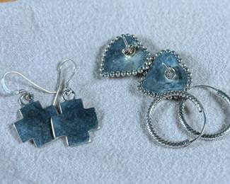 This lot features three (3) pairs of sterling silver earrings with a total approx. weight of 15.29 grams.