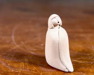 This lot features an original sculpture by listed artist, Maxine Toya and measures, 2.75” H.