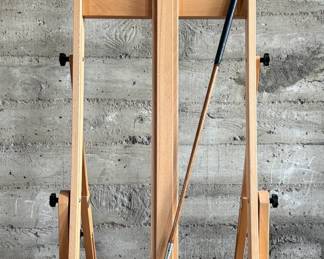 A vintage Frank Bryan Special Mashie golf club featuring a steel head and a wooden shaft. The head is marked with branding and includes the inscription ‘Special Mashie.’ The club has a textured steel clubface and a leather-wrapped grip, showing signs of wear consistent with use and age.