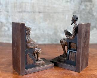 This lot features a vintage pair of wooden Don Quixote Spanish folk art bookends in good condition. “Made in Spain” tagged underneath.