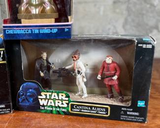 STAR WARS FIGURES AND COLLECTIBLES IN ORIGINAL PACKAGING