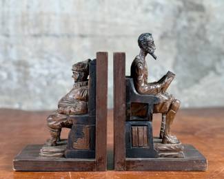 This lot features a vintage pair of wooden Don Quixote Spanish folk art bookends in good condition. “Made in Spain” tagged underneath.