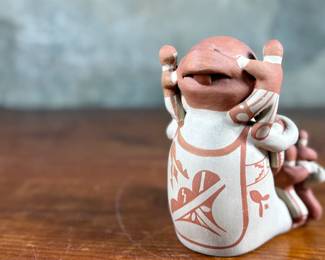 This lot features an original sculpture by listed Pueblo artist, Lupe Lucero Loretto. Signed underneath and measures, 5.25” H.