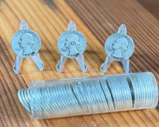 This lot features fifty-two (52) 90% silver quarters with a $13.00 face value.