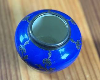 Johann Haviland Bavaria porcelain vase featuring a cobalt blue glaze with gilt floral design and sterling silver accents/rim. Bottom stamp reads “Johann Haviland Bavaria.” Measures 2” H, suitable as a small decorative piece or bud vase. Good condition with no visible cracks or chips.