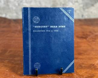 Mercury Head Dime collection spanning 1916 to 1945 housed in a blue Whitman Hobby album. Various coins from the series are included, with a total of thirty (30) in the album.
