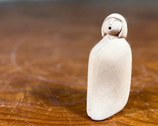 This lot features an original sculpture by listed artist, Maxine Toya and measures, 2.75” H.