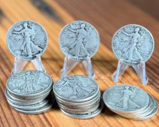 This lot features nineteen (19) 90% silver Walking Liberty half dollars.