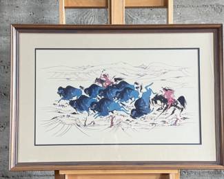 "Hunting The Spirit Buffalo", a professionally framed print by listed artist, Woody Crumbo. Measures in frame, 26.5” H x 39” W.