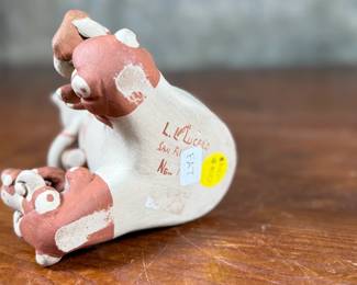 This lot features an original sculpture by listed Pueblo artist, Lupe Lucero Loretto. Signed underneath and measures, 5.25” H.