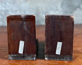 This lot features a vintage pair of wooden Don Quixote Spanish folk art bookends in good condition. “Made in Spain” tagged underneath.